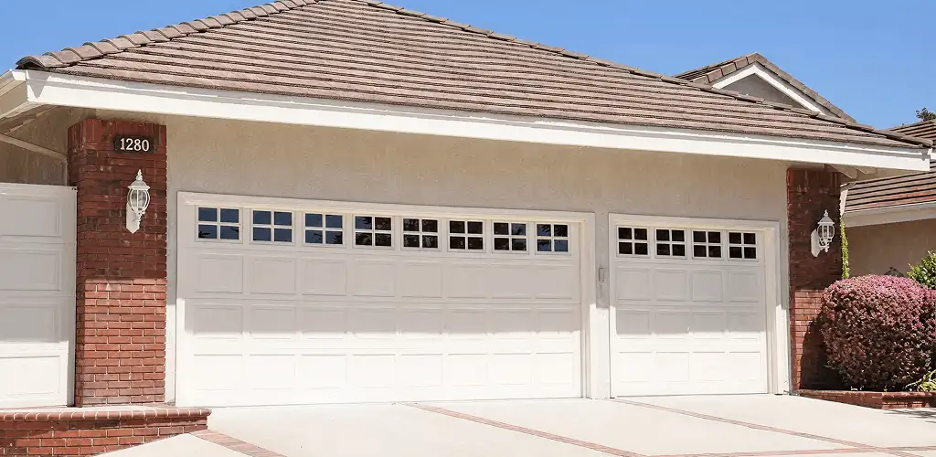 Residential garage door repair service for a double garage door in Orlando, FL