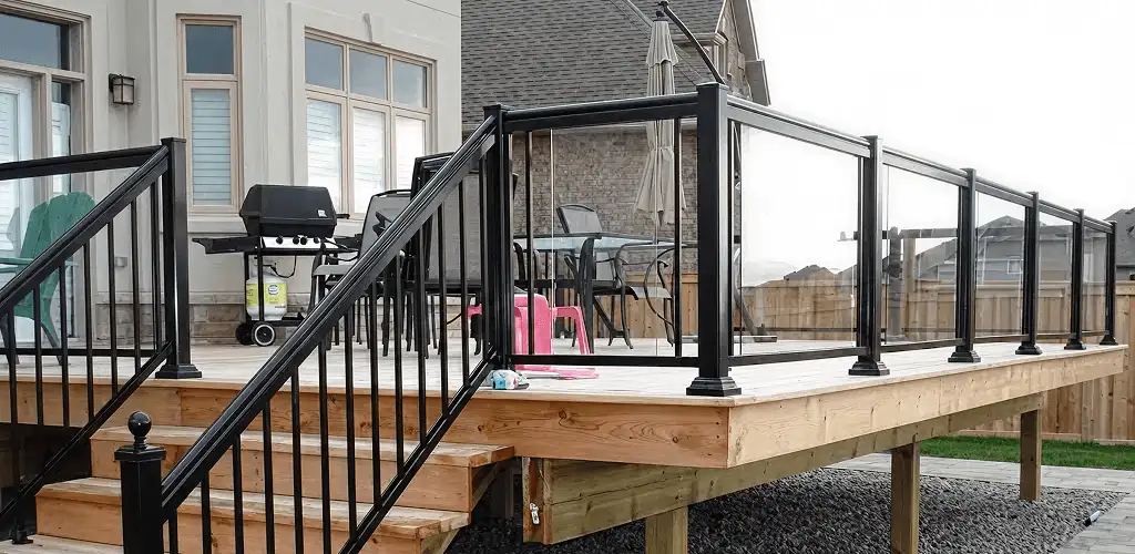 Handrail installation on a deck staircase for safety and code compliance in Orlando, FL
